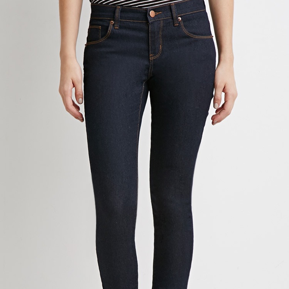 4 Pairs of Forever 21 skinny ankle jeans.